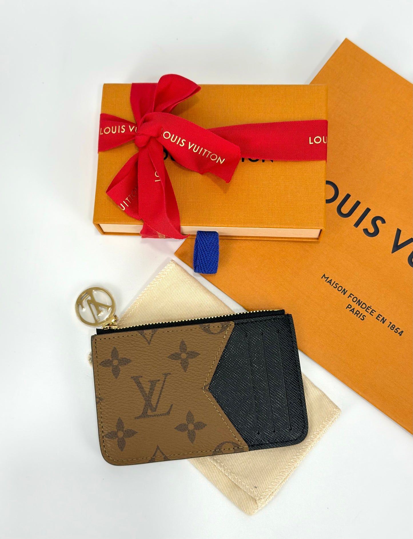 Louis Vuitton Reverse Monogram Zipped Romy Card Holder