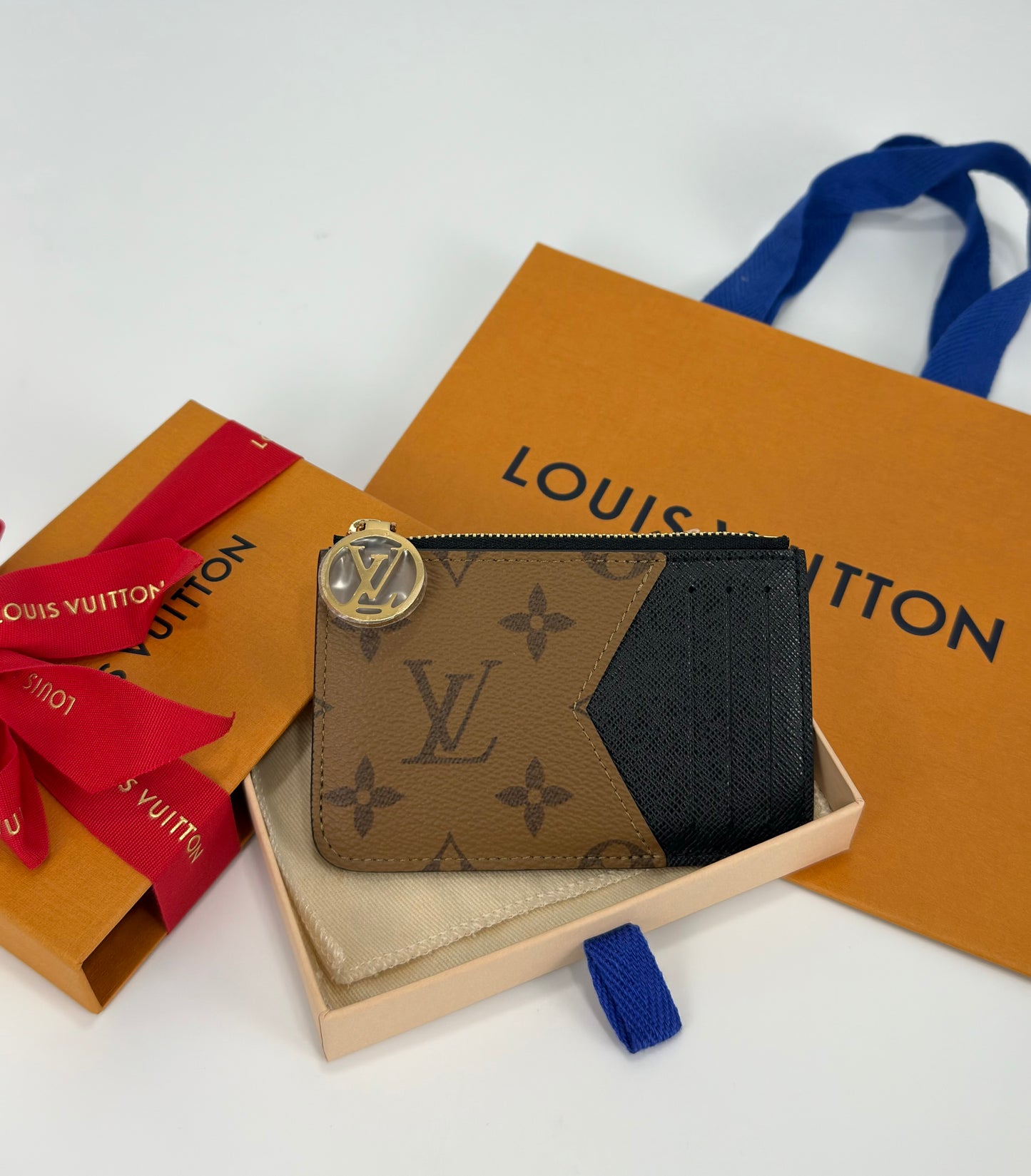 Louis Vuitton Reverse Monogram Zipped Romy Card Holder