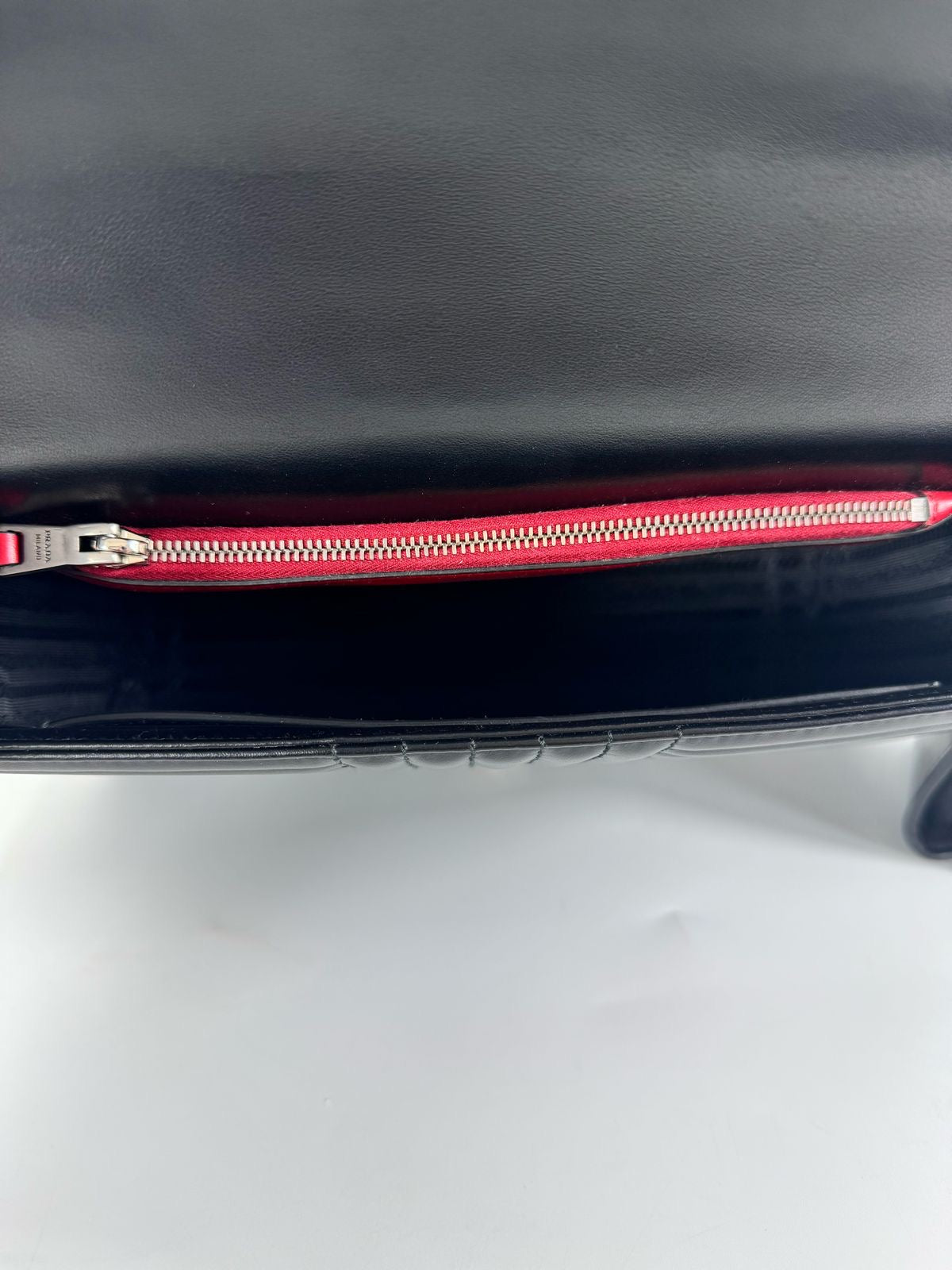 Prada diagramme flap