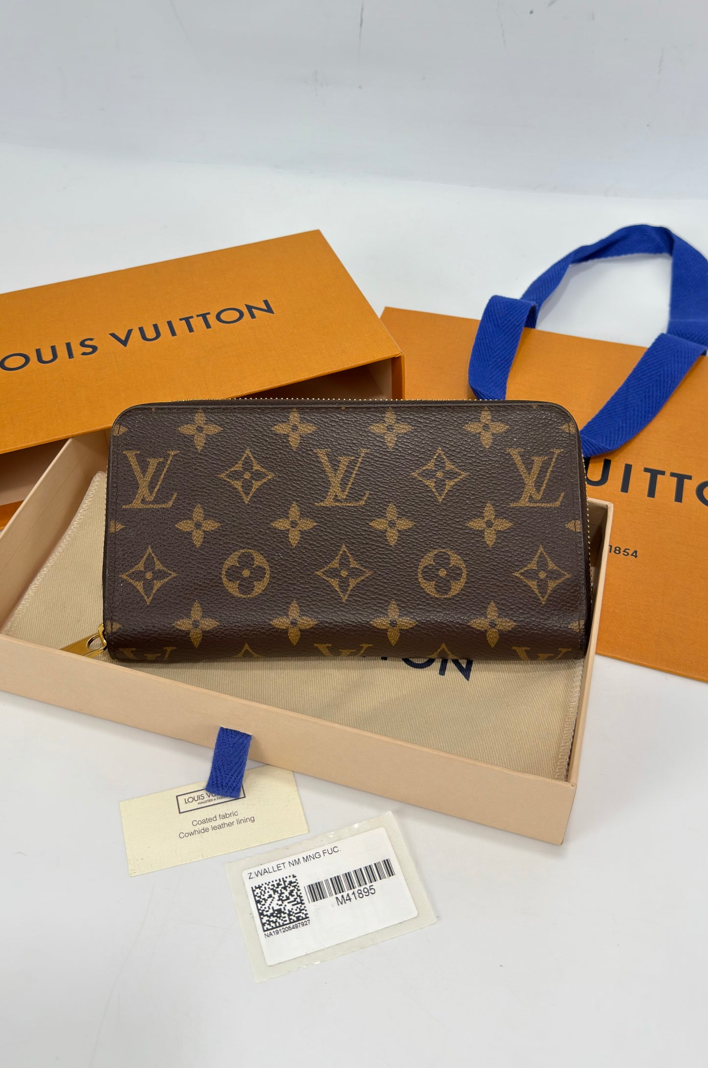 Louis Vuitton Monogram Zippy Wallet