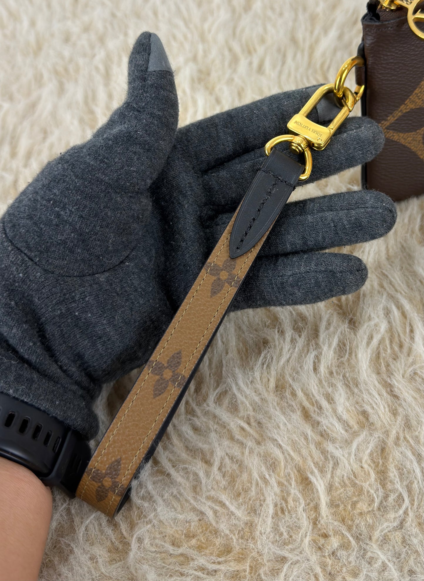 Louis Vuitton 
Monogram Giant Reverse Trio Pouch