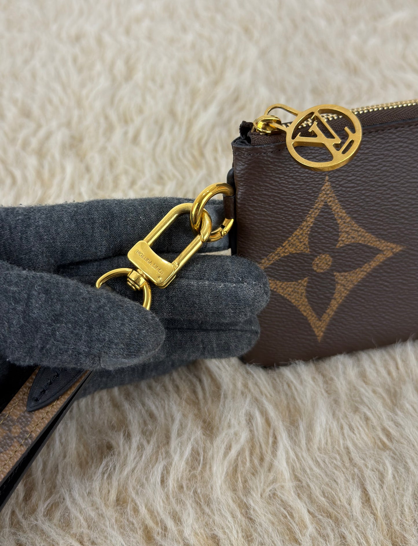 Louis Vuitton 
Monogram Giant Reverse Trio Pouch
