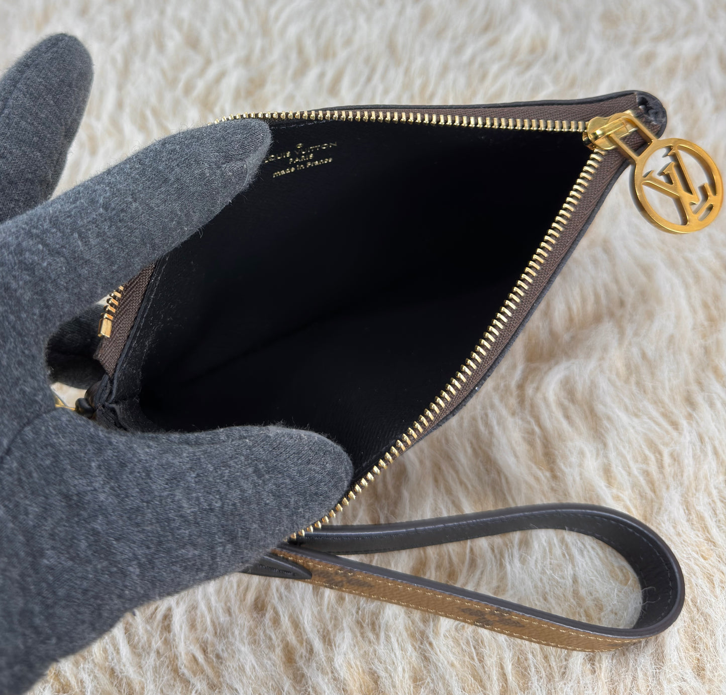 Louis Vuitton 
Monogram Giant Reverse Trio Pouch