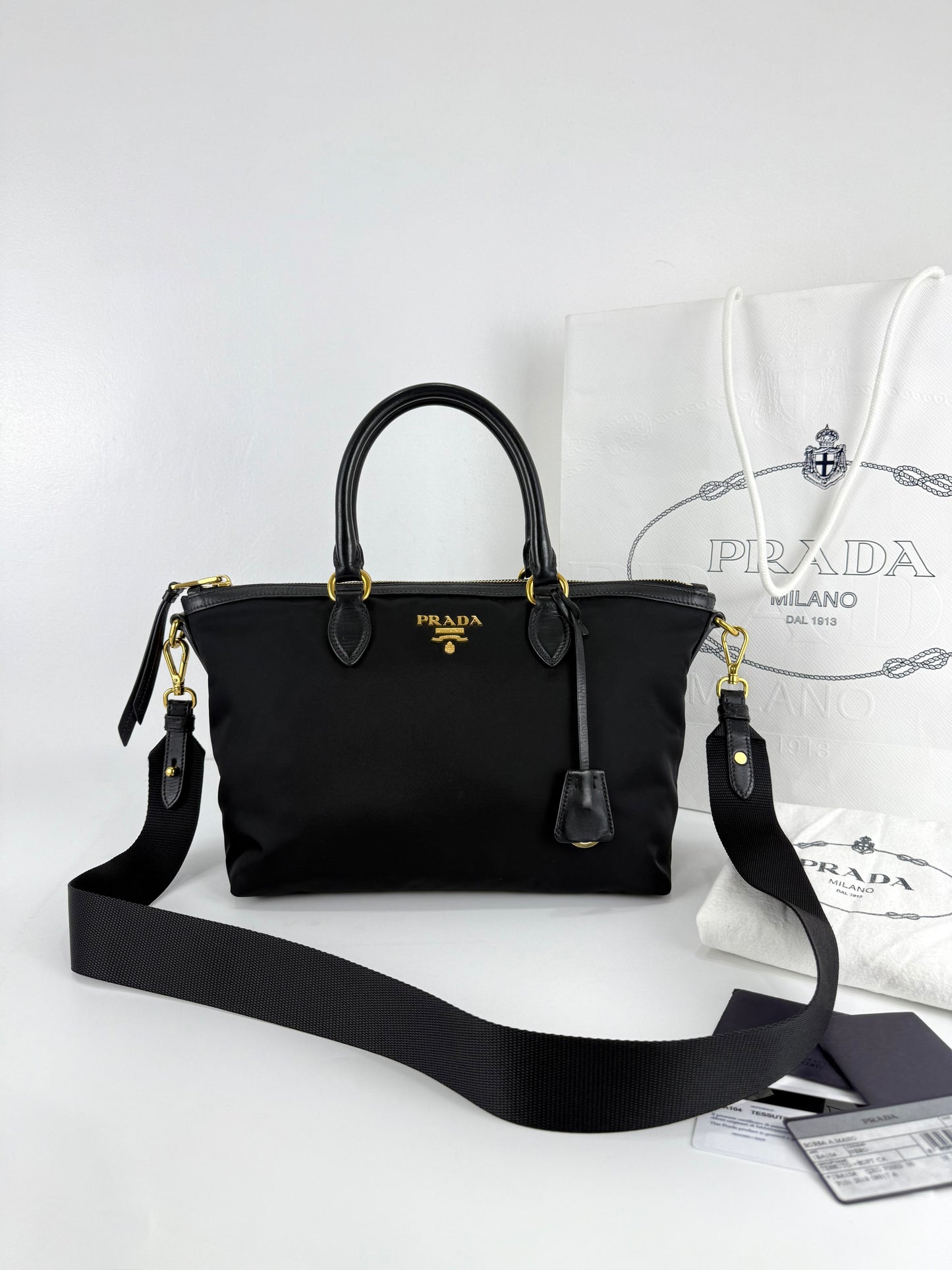 Prada Nylon Tessuto Black Leather Clochette
Crossbody Tote Bag