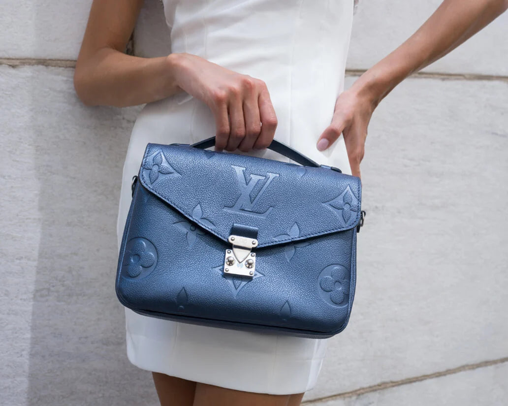 Louis Vuitton Navy Nacre Metallic Empreinte
Monogram Giant Pochette Metis