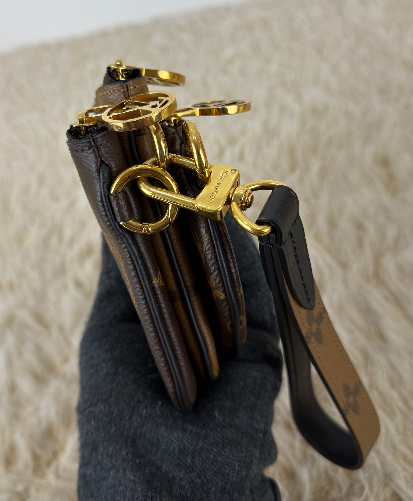 Louis Vuitton 
Monogram Giant Reverse Trio Pouch