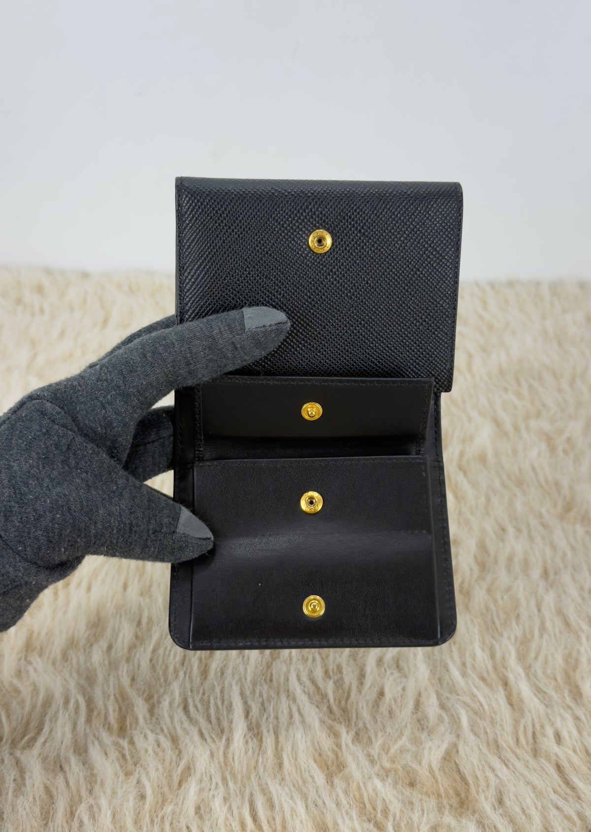 Prada Saffiano Leather Short Trifold
Clasp Wallet 1MH176