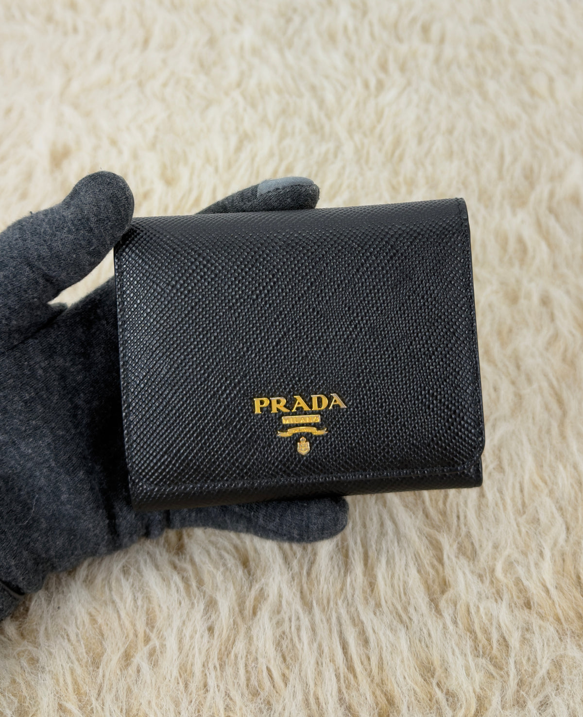 Prada Saffiano Leather Short Trifold
Clasp Wallet 1MH176