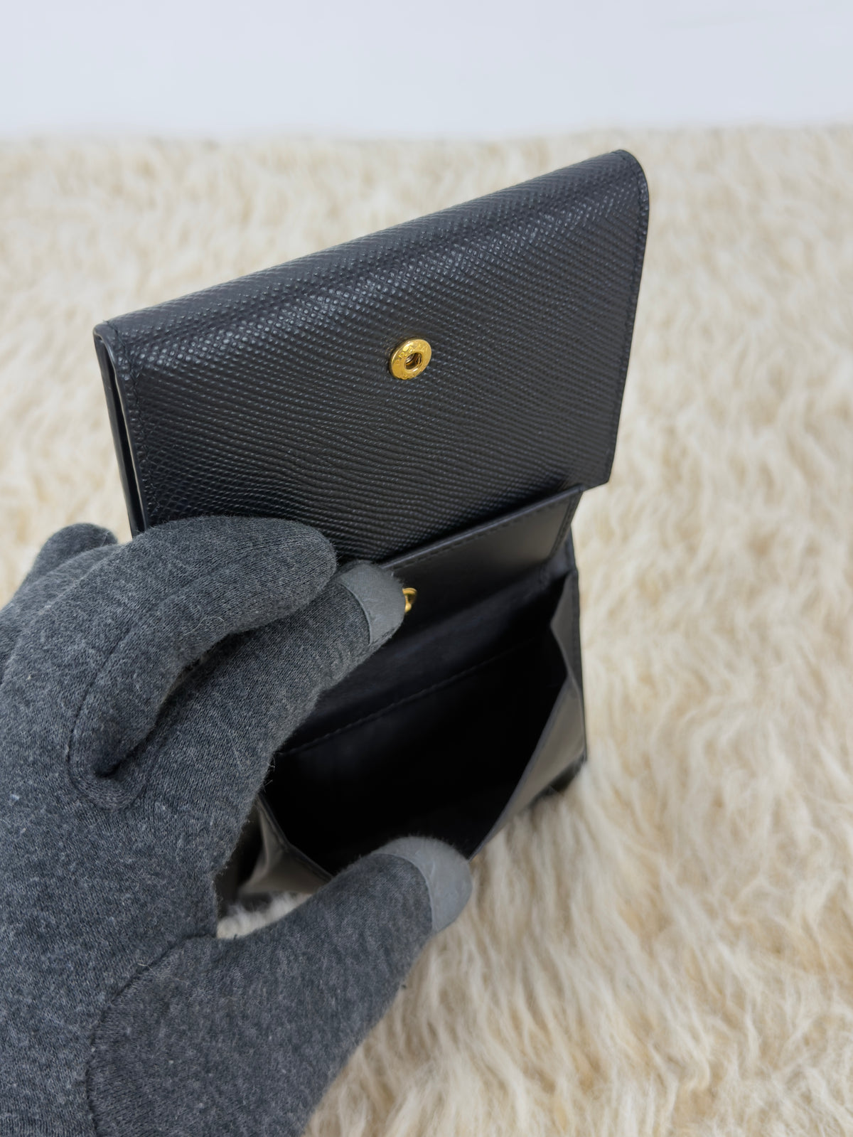 Prada Saffiano Leather Short Trifold
Clasp Wallet 1MH176