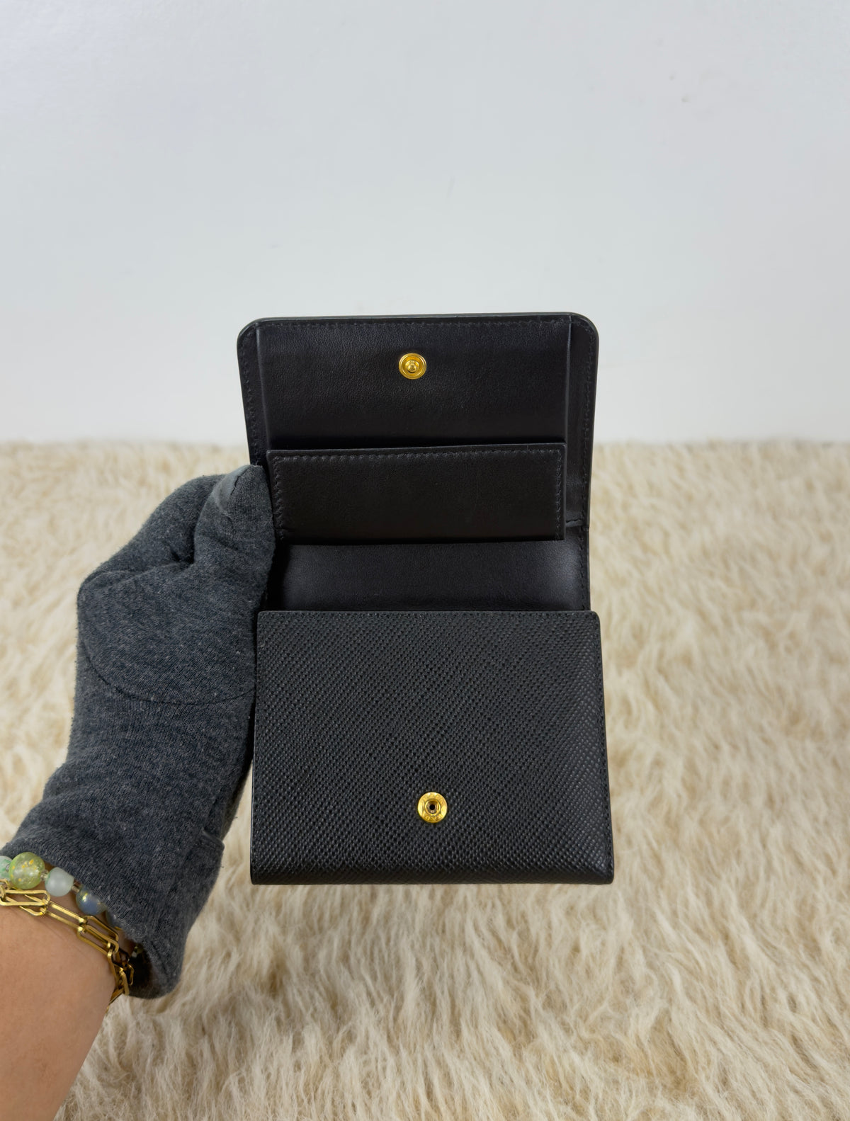 Prada Saffiano Leather Short Trifold
Clasp Wallet 1MH176