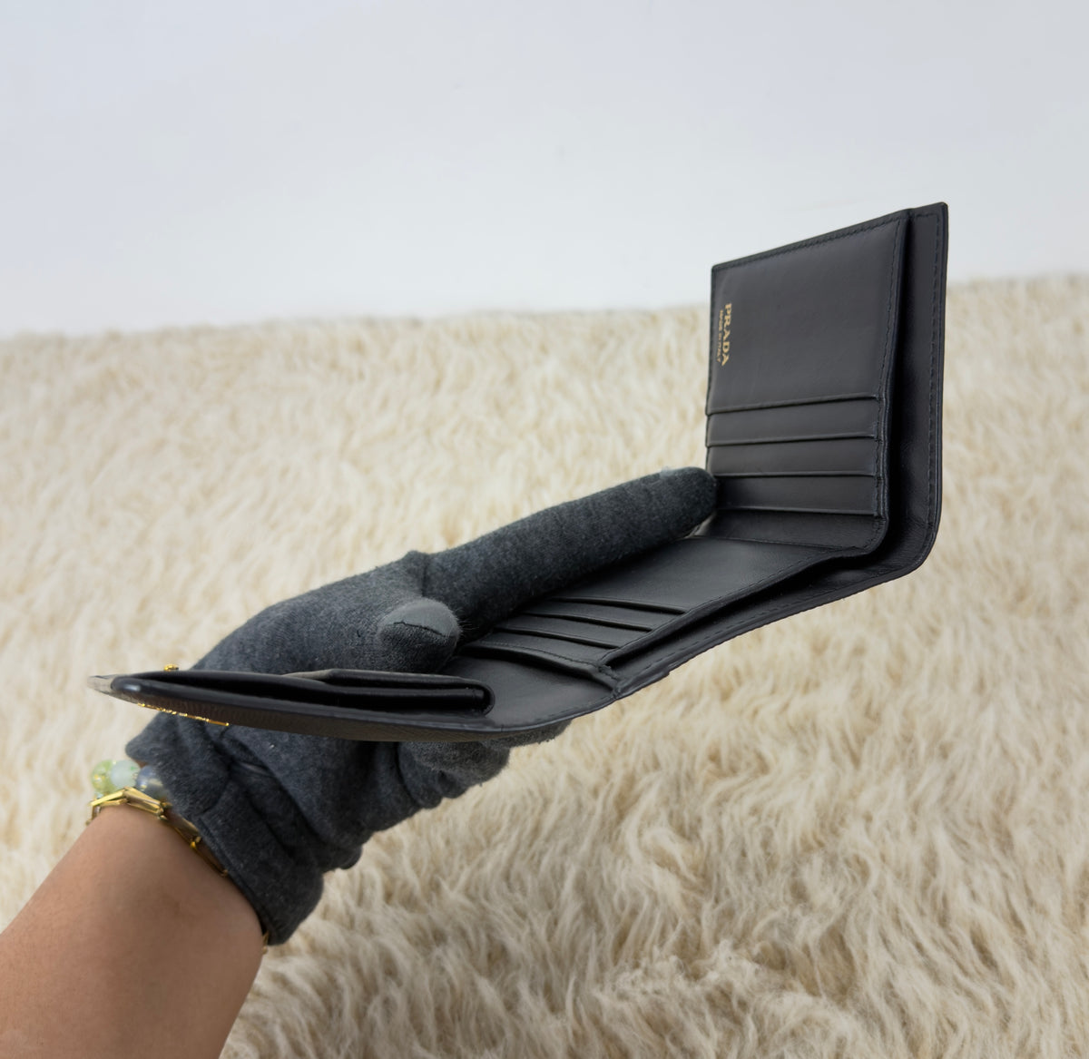 Prada Saffiano Leather Short Trifold
Clasp Wallet 1MH176