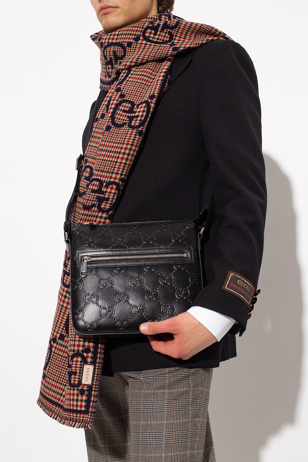 Gucci GG Embossed Small Messenger Bag