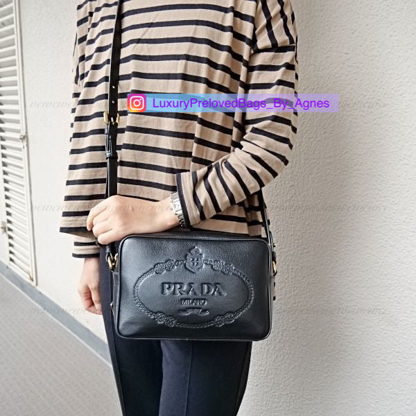 Prada Embossed Logo Camera Bag