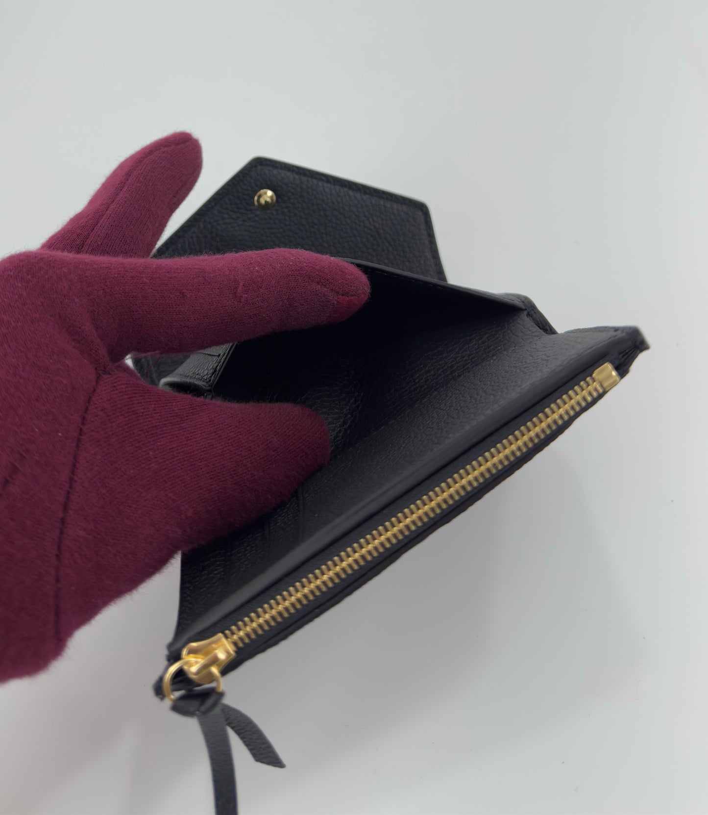 Louis Vuitton Victorine Wallet In Black Monogram
Empreinte Leather (1 )