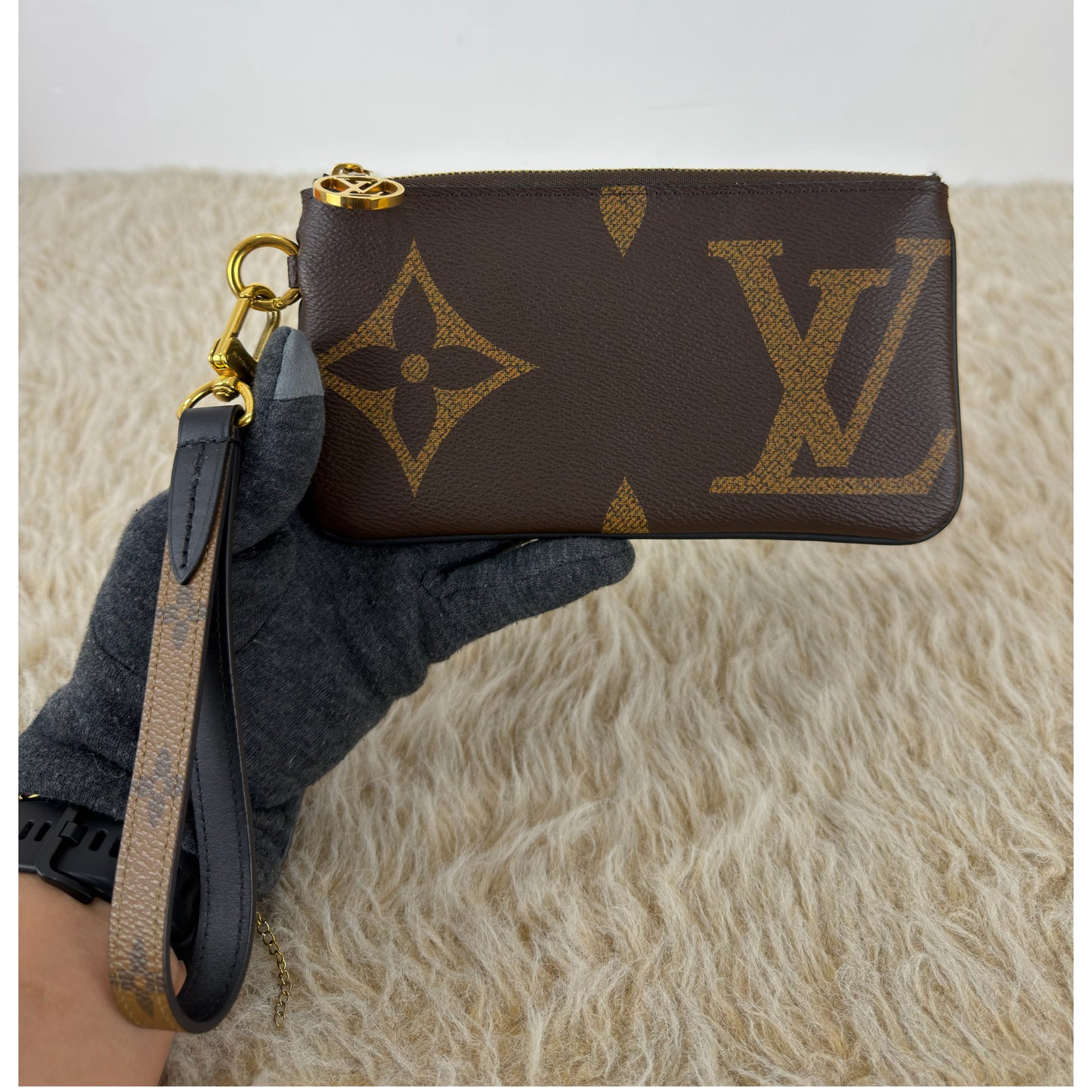 Louis Vuitton 
Monogram Giant Reverse Trio Pouch