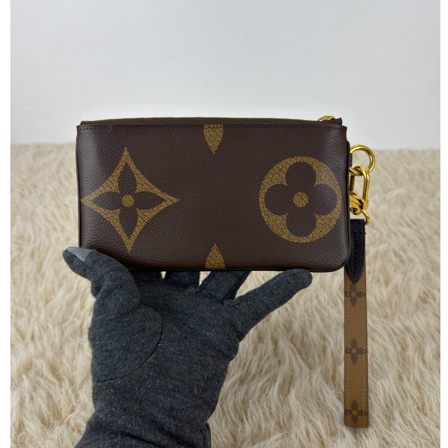 Louis Vuitton 
Monogram Giant Reverse Trio Pouch