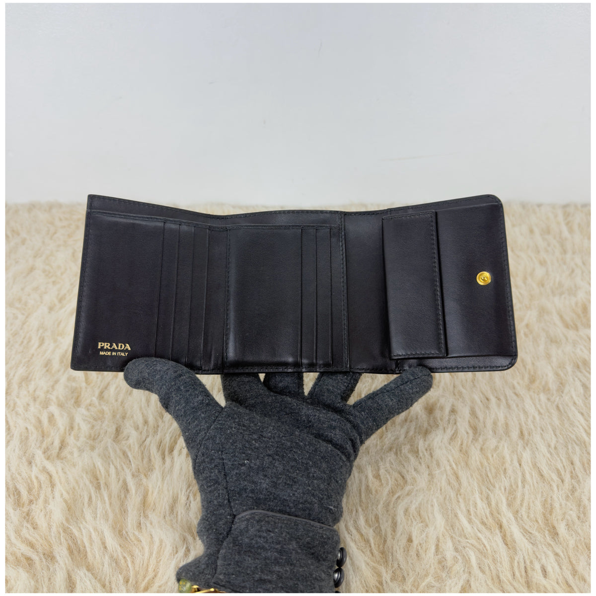 Prada Saffiano Leather Short Trifold
Clasp Wallet 1MH176