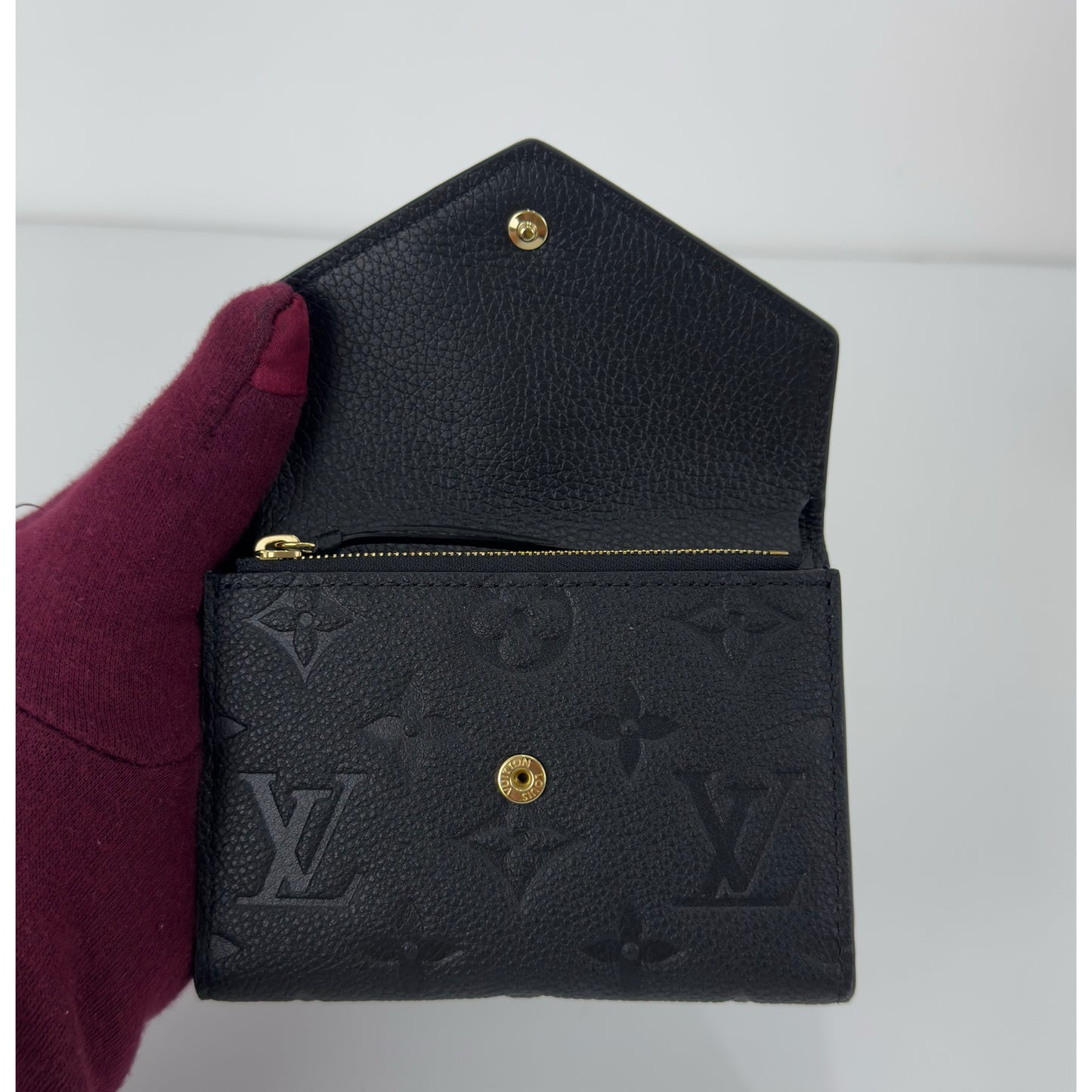 Louis Vuitton Victorine Wallet In Black Monogram
Empreinte Leather (1 )