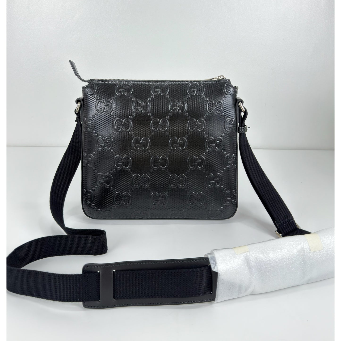 Gucci GG Embossed Small Messenger Bag
